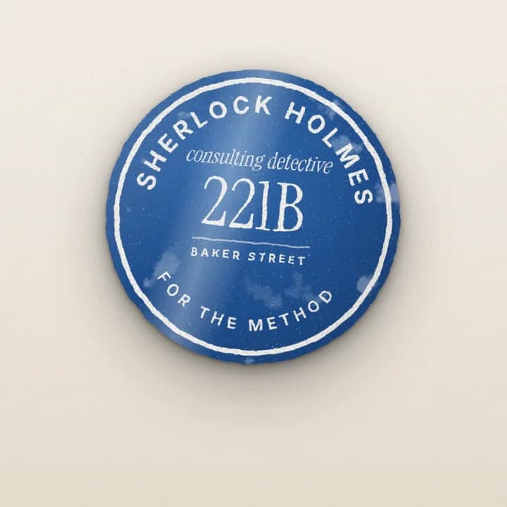 A blue plaque: Sherlock Holmes, consulting detective, 221B Baker Street.